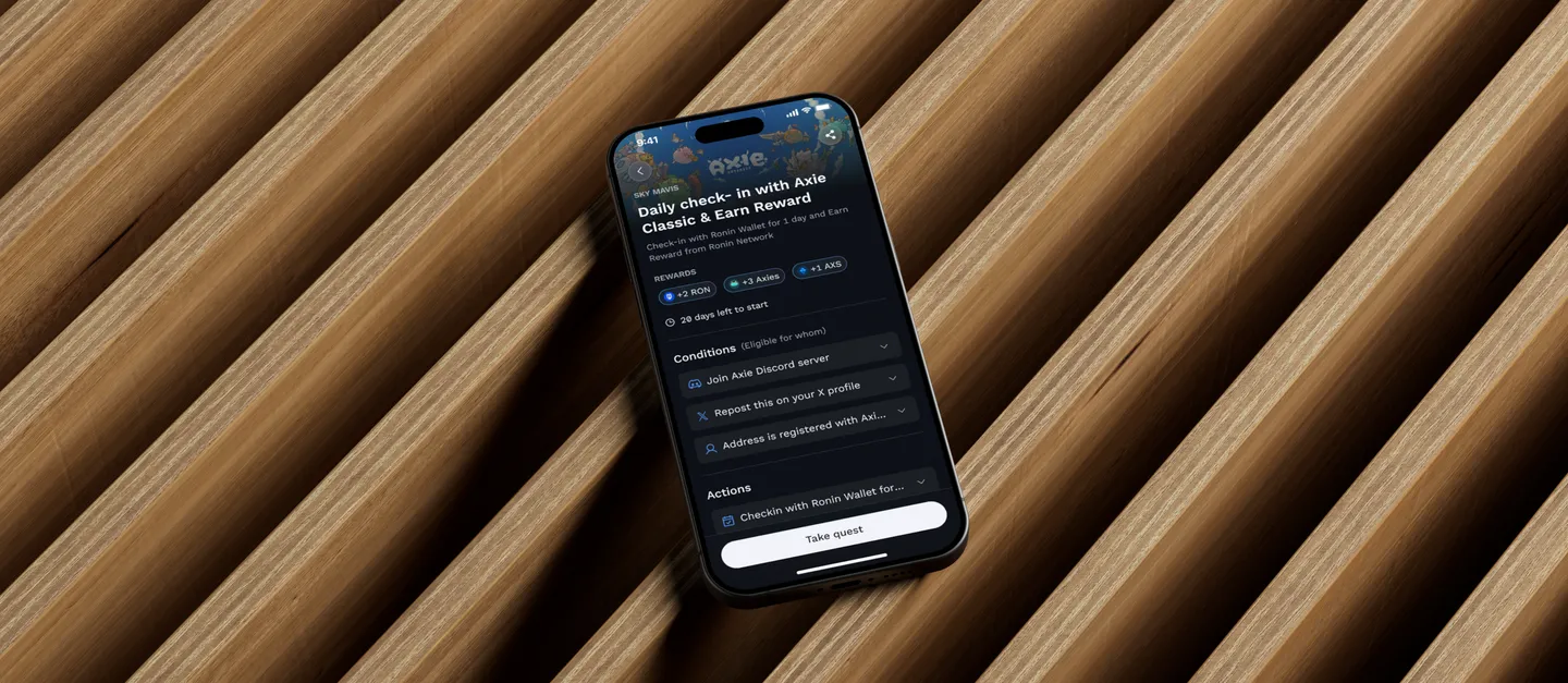 Phone showing a dark Ronin Wallet quest screen with a daily check-in bounty, lying on diagonally ridged wooden slats